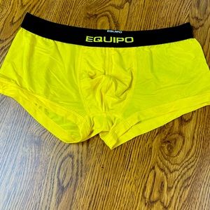 Mens worn poly spandex trunks Size M
